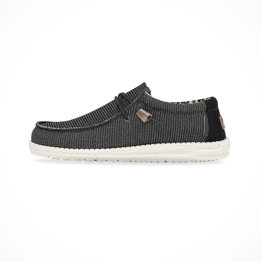 Product image: Footwear Hey Dude Mens Wally Knit Charcoal, side profile view.
