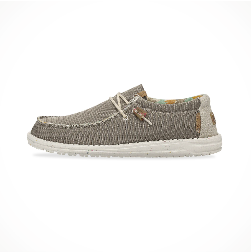 Product image: Footwear Hey Dude Mens Wally Knit Desert Brown, side profile view.