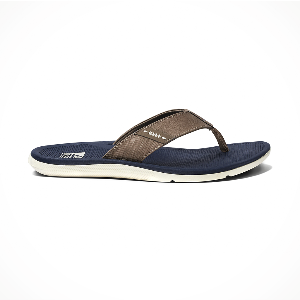 Product image: Footwear Reef Mens Santa Ana Navy Khaki, side profile view.