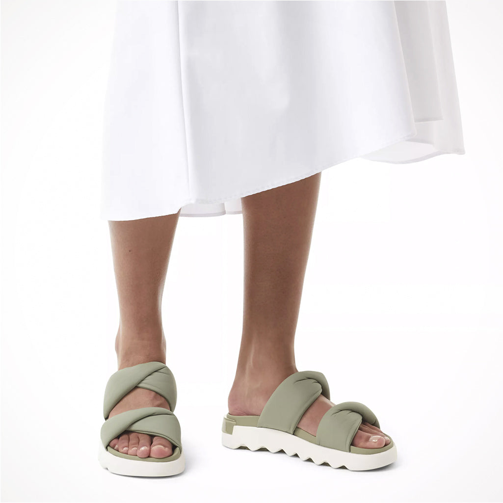 Product image: Footwear Sorel Womens Viibe Twist Slide Safari Stone, lifestyle product shot.