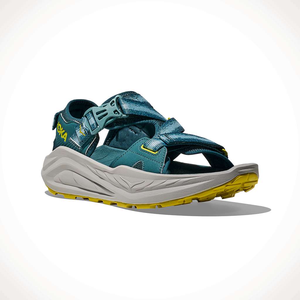 Product image: Hoka Infini Hike TC Blue Twilight Pea Green Mens 2025, shown from a three-quarter angled view.