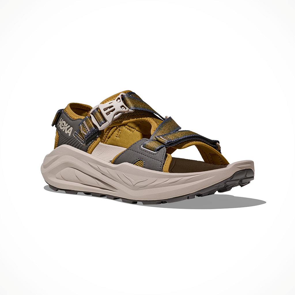 Product image: Hoka Infini Hike TC Mustard Seed Putty Mens 2026, shown from a three-quarter angled view.