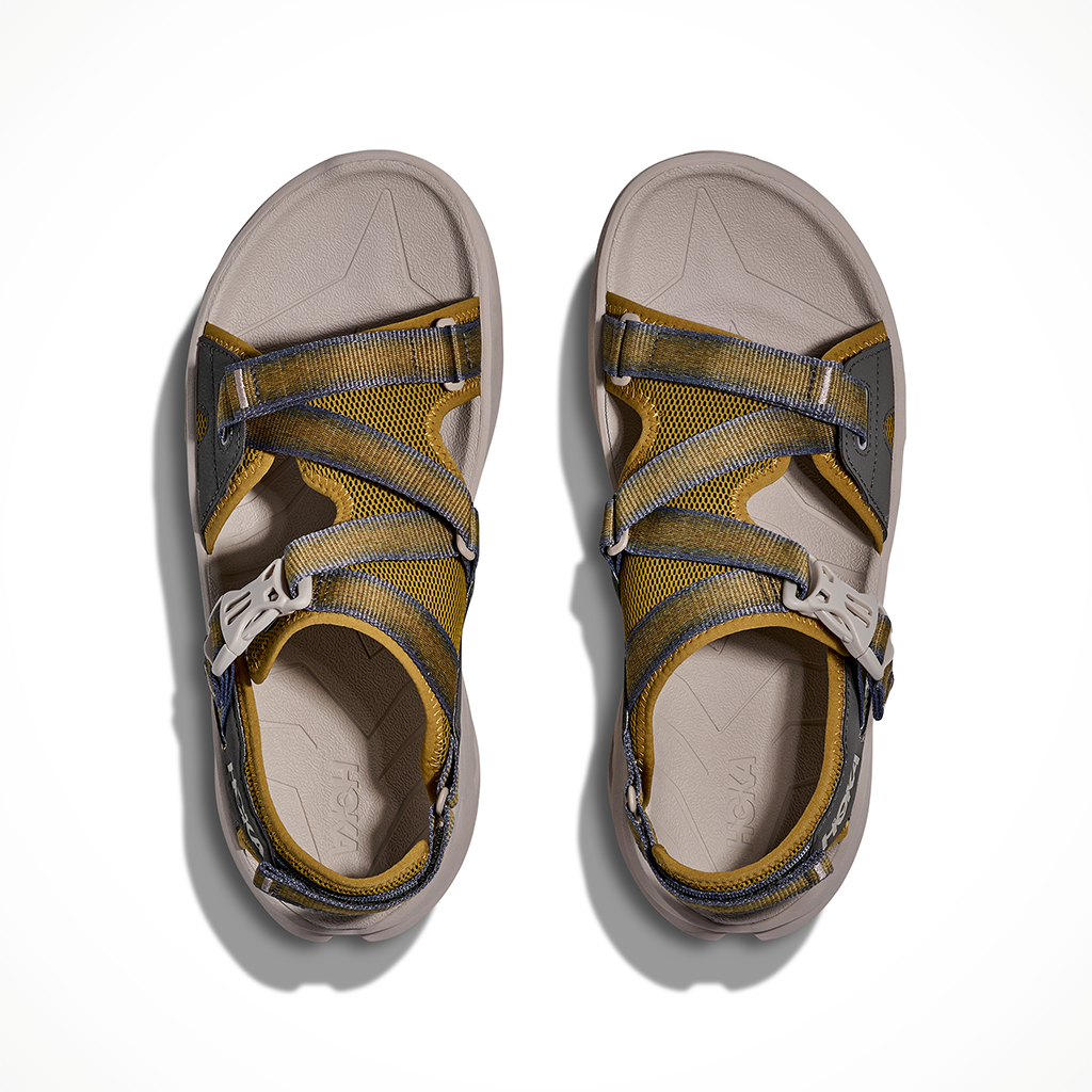 Product image: Hoka Infini Hike TC Mustard Seed Putty Mens 2026, shown as a pair.