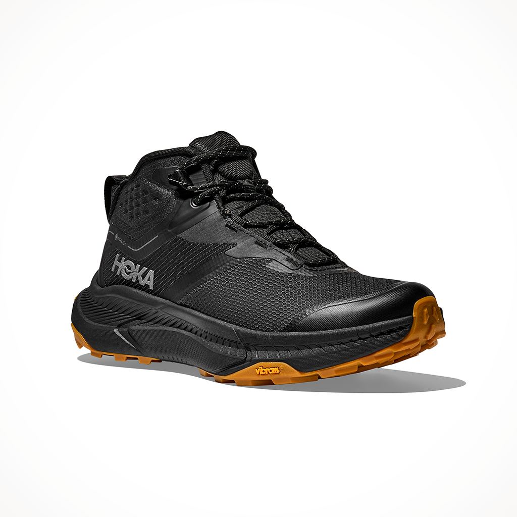Product image: Hoka Transport Hike GTX Black Black Mens 2025, shown from a three-quarter angled view.