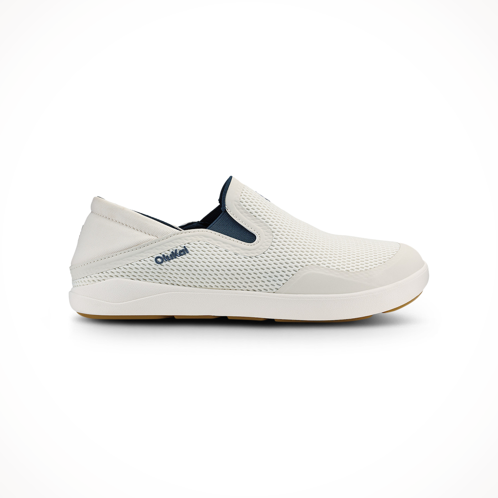 Product image: Olukai Moku Slip On White Sand Trench Blue Mens 2026, shown in primary marketing view.