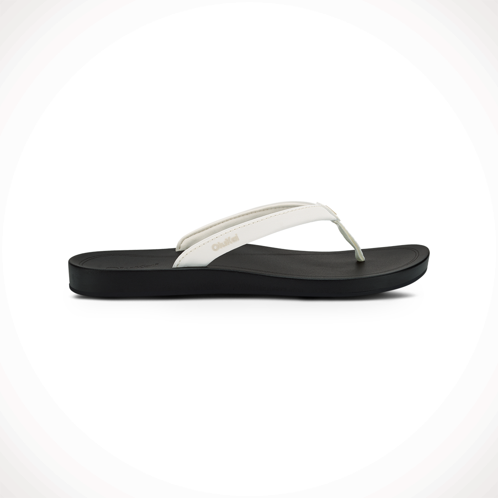 Product image: Olukai Uiki Bright White Lava Rock Womens 2025, shown in primary marketing view.
