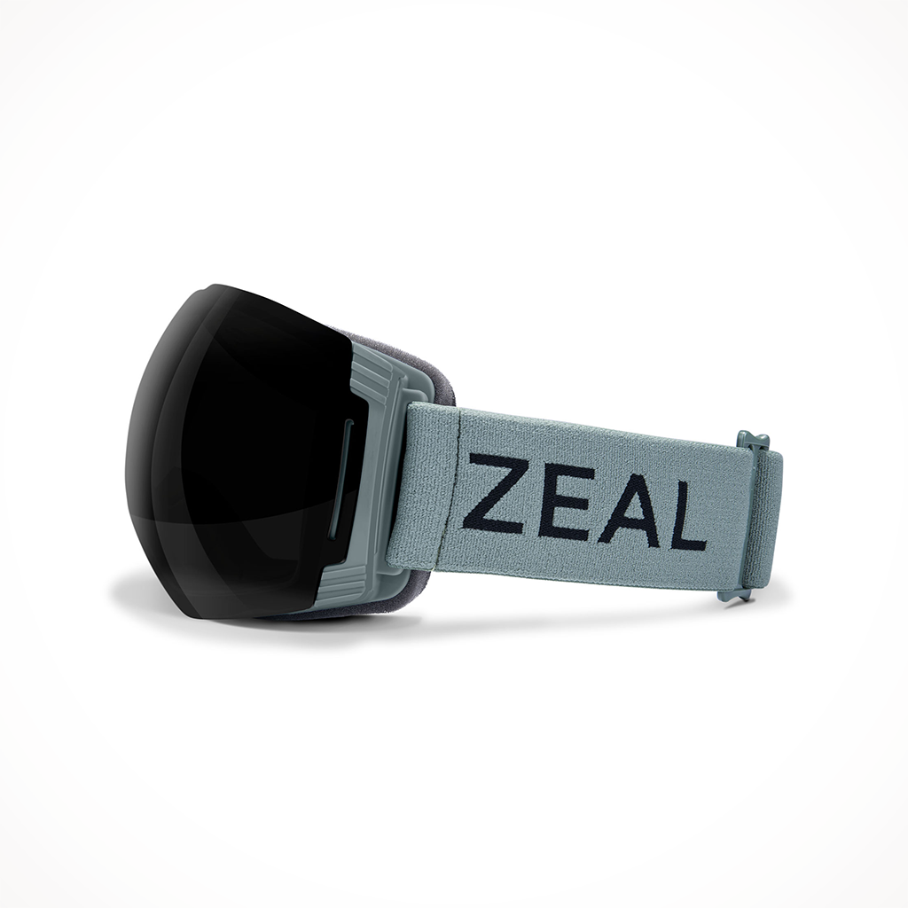 Product image: Zeal Cloudfall XL Spuce Dark Grey Sky Blue Mirror Goggle 2025, shown from the left side profile.