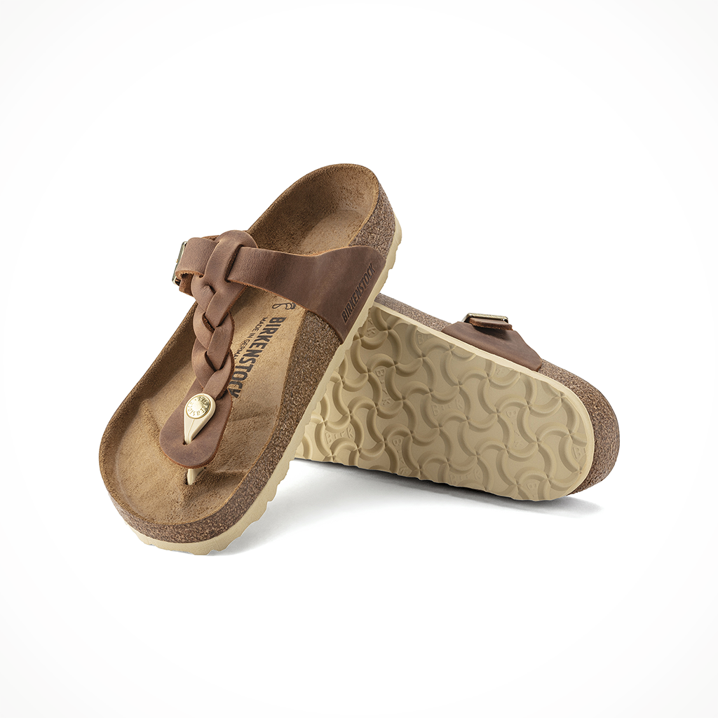 Product image: Birkenstock Gizeh Braided Leather Cognac Womens 2026, shown as a pair.