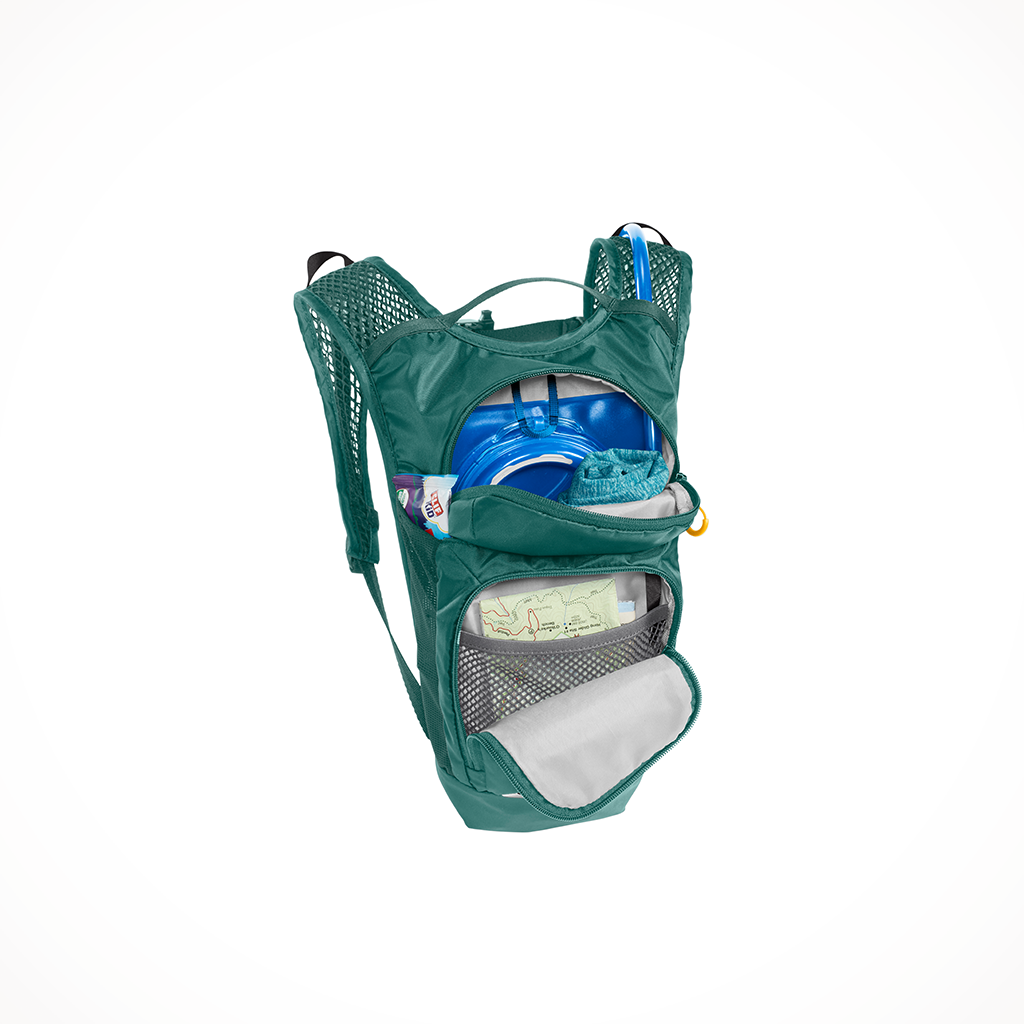 https://www.outdoorsports.com/cdn/shop/files/Camping_Backpacks-Youth-CamelBak-Mini_Mule-Green_Mountains-Open_1200x.png?v=1689685052