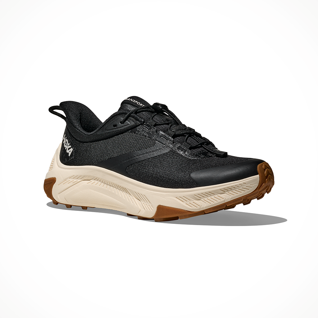 Product image: Hoka Transport 2 Black Alabaster Womens 2026, shown from a three-quarter angled view.