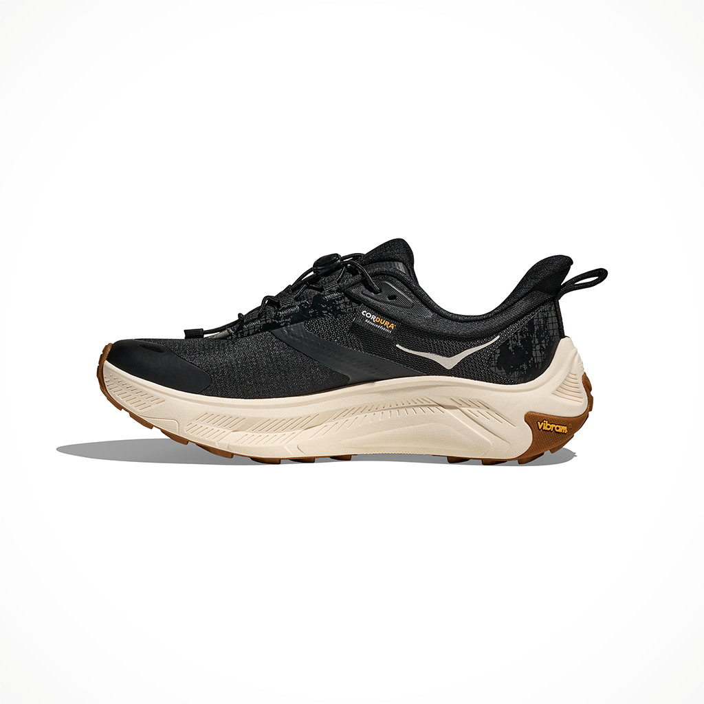 Product image: Hoka Transport 2 Black Alabaster Womens 2026, shown from the left side profile.