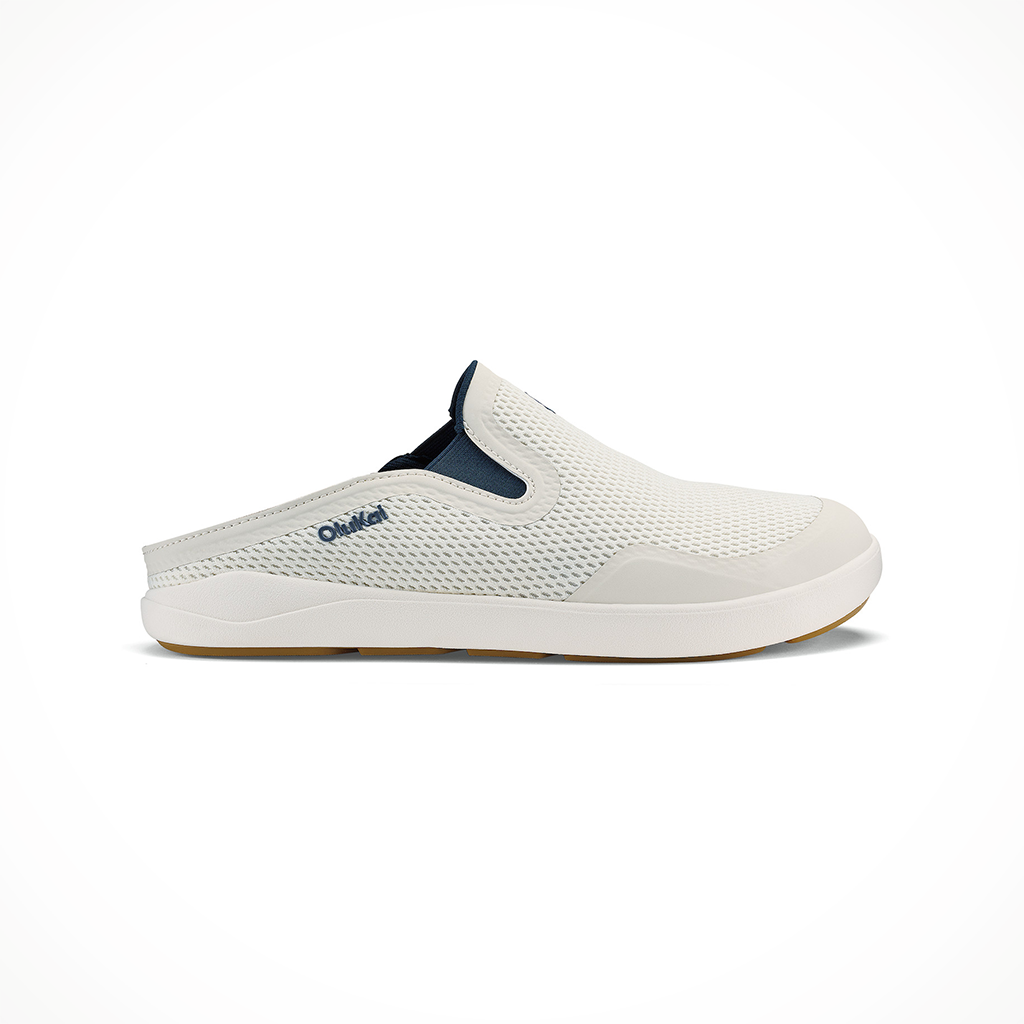Product image: Olukai Moku Slip On White Sand Trench Blue Mens 2026 Slide.