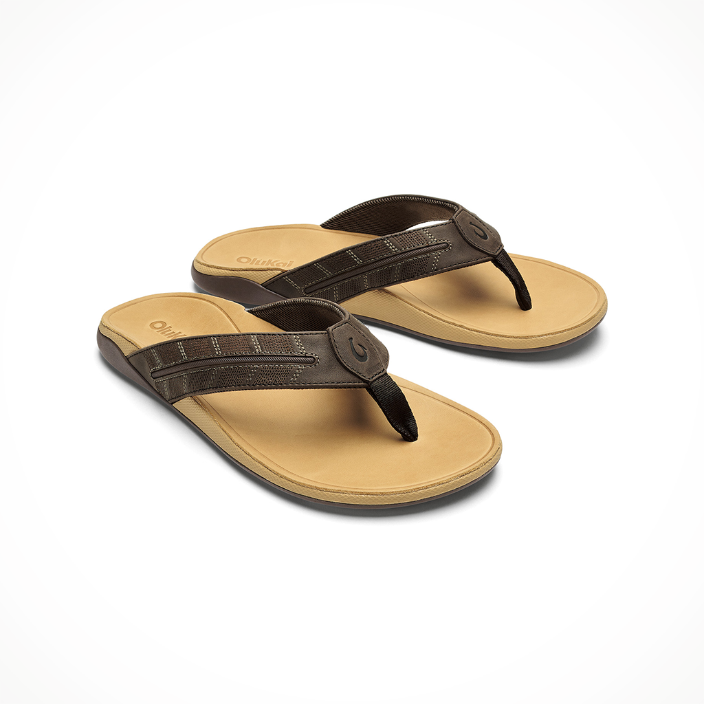 Product image: Olukai Tuahine Palm Dark Java Golden Sand Mens 2026, shown as a pair.