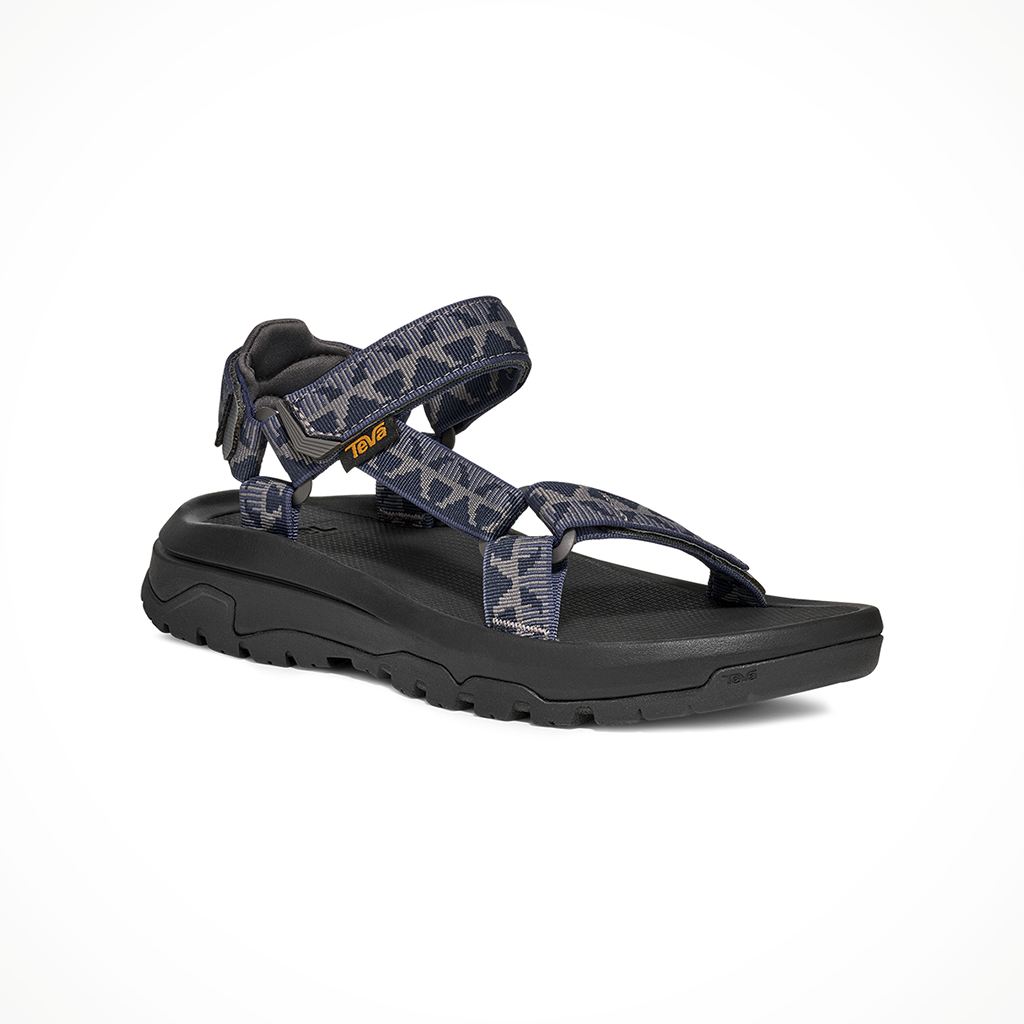 Product image: Teva Hurricane XLT 3 Criss Cross Navy Grey Mens 2026, shown from a three-quarter angled view.
